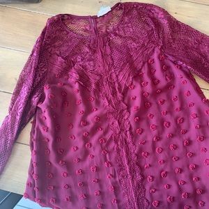 Large red lace blouse purchased at adorn boutique for 30. Never worn!